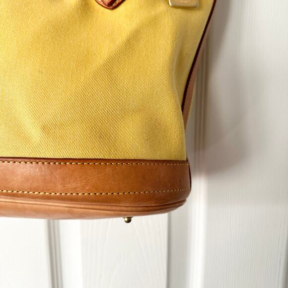 Dooney & Bourke Cabriolet Yellow Canvas Leather Trim Bucket Buckle Shoulder Bag - Picture 13 of 15